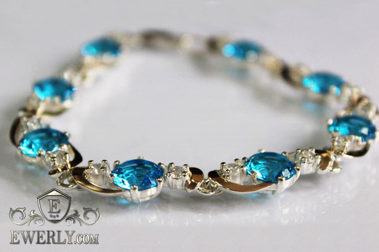 Женский браслет из серебра с голубыми камнями (17 г) купить по цене 13935руб с доставкой в Санкт-Петербург.