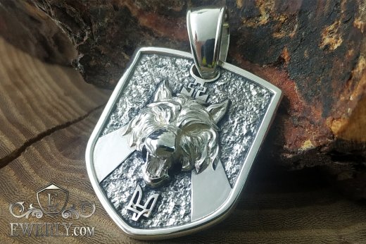 Buy a silver wolf pendant. Silver pendant with wolf