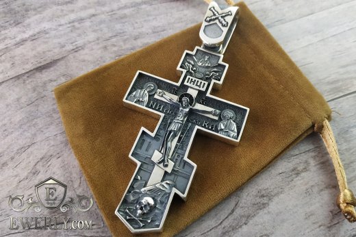Large men's cross made of silver with an eyelet under the order