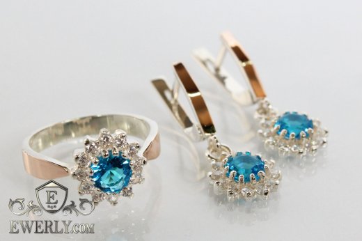 Купити комплект: кільце і сережки зі срібла з блакитним камінням